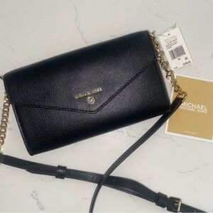 Black envelope Michael Kors cross body bag